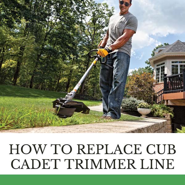 Man using sting trimmer on grass